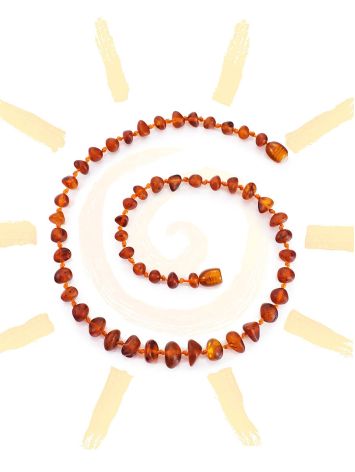 Kids' natural amber necklace with softly polished beads, image 