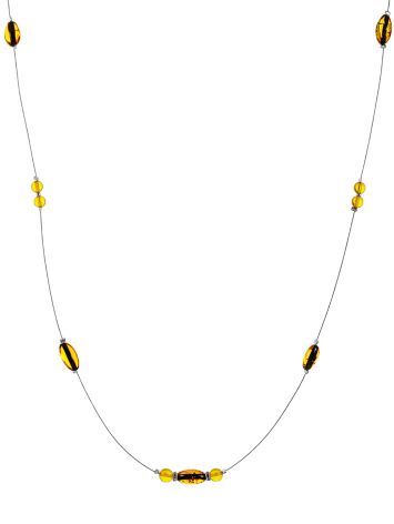 Delicate, weightless string necklace with natural amber, image 