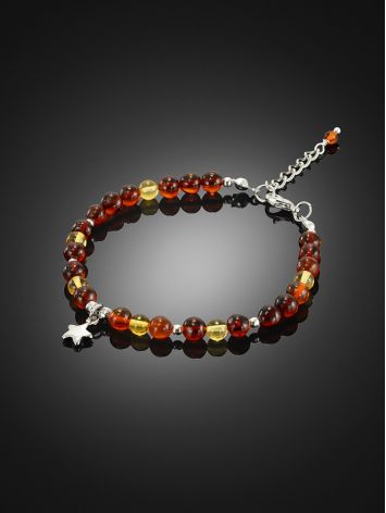 Charming bracelet made of natural amber with a star pendant, image , picture 2