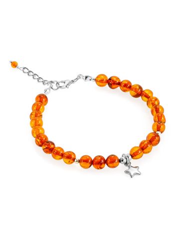 Delicate bracelet made of natural cognac amber with a star-shaped pendant, image , picture 3