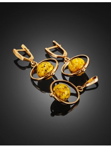 Bright pendant featuring a circular amber stone, image , picture 4