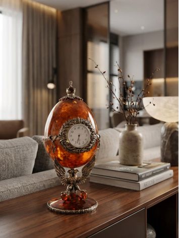 The 'Sovereign' egg-shaped clock-box, crafted from amber and bronze, image , picture 6