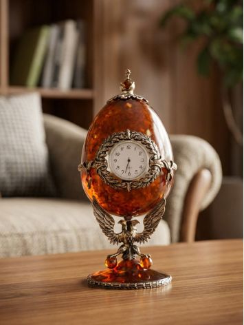 The 'Sovereign' egg-shaped clock-box, crafted from amber and bronze, image , picture 2
