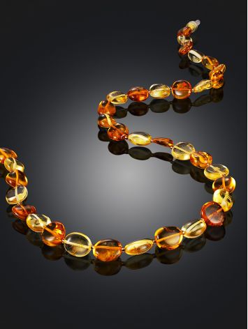 Beautiful variegated beads made of natural amber in two colors, image , picture 2